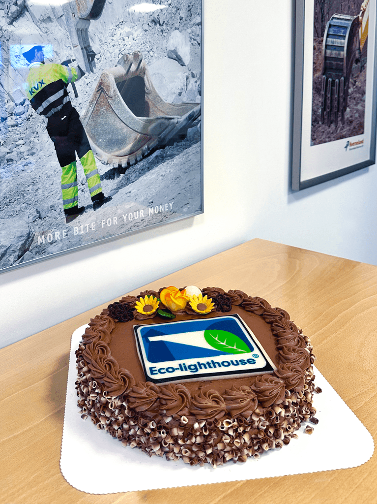 Eco-lighthouse cake at KVX office, Celebration